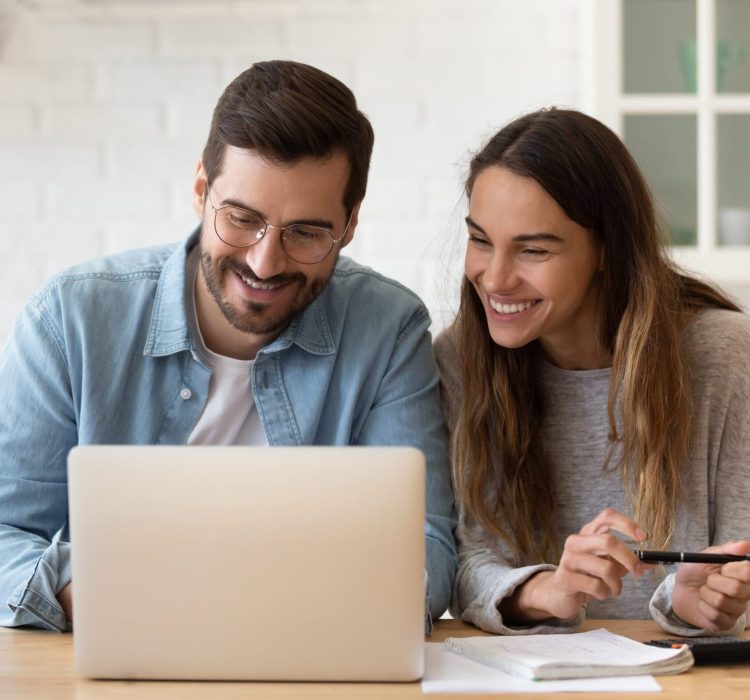 Happy,Young,Couple,Planning,Budget,,Reading,Good,News,In,Email, couple paying rent online