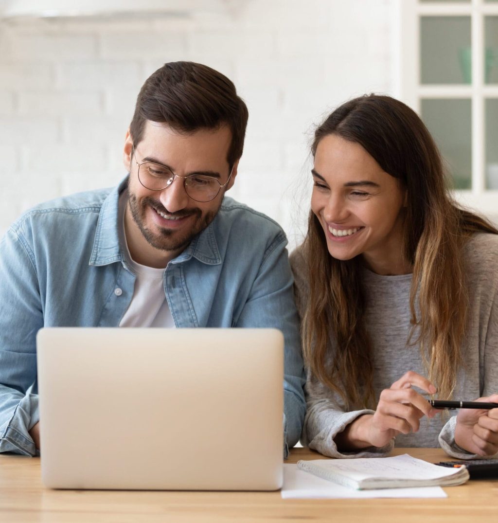 Happy,Young,Couple,Planning,Budget,,Reading,Good,News,In,Email, couple paying rent online