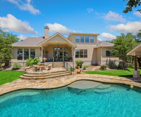A,Home,With,A,Swimming,Pool,And,Greenery Arizona house with pool